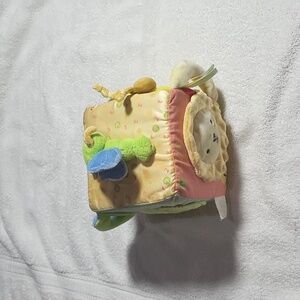 Carters 0S yellow and blue and green